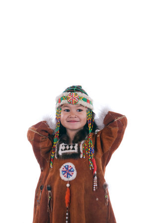 portrait child chukchi clad in national gown on white background
