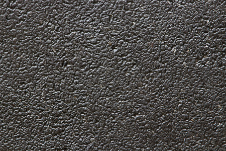 Dark grey black stone background or texture.