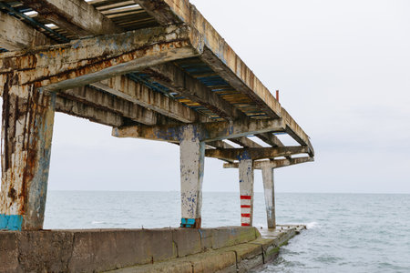 Abandoned bridge in the sea. Pier on the Black Sea in Sochi, Russiaの写真素材