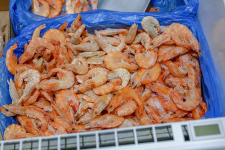 Frozen shrimp in the refrigerator in the supermarket. Healthy food and diet. Close-up.の写真素材