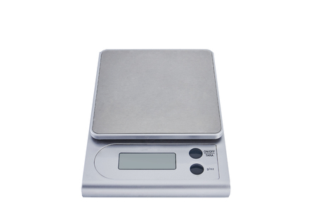 Silver electronic kitchen scales of white backgroundの写真素材