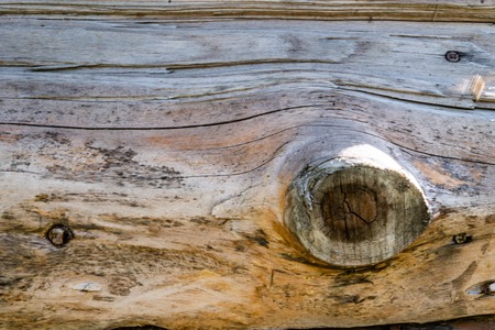 close-up of a vintage board with a knotの写真素材