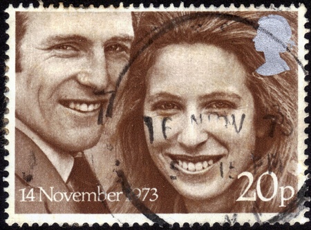 United Kingdom-CIRCA 1973  stamp printed in the United Kingdom, shows images of Princess Anne   Captain Mark Phillips,   dedicated  to Royal Wedding  ,November 14, 1973 Windsor, circa 1973のeditorial素材