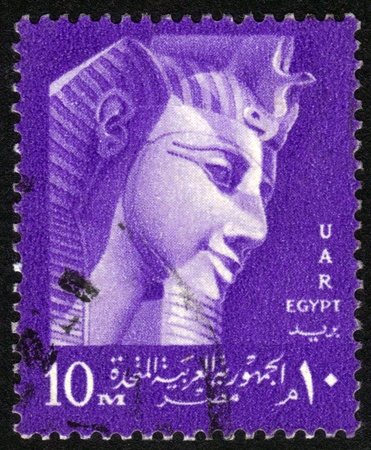 EGYPT - CIRCA 1970s  A stamp printed in Egypt shows Mask of Tutankhamun, circa 1970のeditorial素材