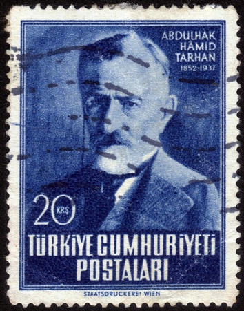 Turkey-CIRCA 1952  stamp printed in Turkey, shows images of Turkish writer Abdulhak Hamid Tarhan, is dedicated to the centenary of his birth, circa 1952のeditorial素材