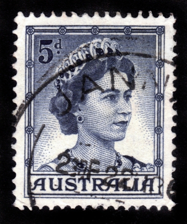 AUSTRALIA - CIRCA 1959  A stamp printed in Australia showing a portrait of Queen Elizabeth II, circa 1959 のeditorial素材