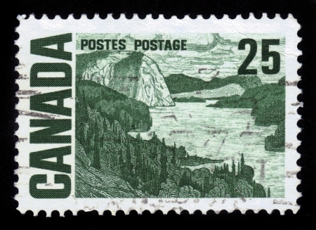 CANADA - CIRCA 1967  A stamp printed by Canada, shows painting   The Solemn Land   by J  E  H  Macdonald, circa 1967のeditorial素材