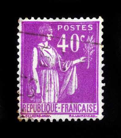 FRANCE - CIRCA 1933  A stamp printed in France shows a woman with an Olive Branch in hand - allegory of Peace , from the series  Peace , circa 1933の写真素材