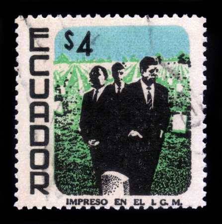 Ecuador - CIRCA 1969: A stamp printed in Ecuador shows image of Martin Luther King, John Fitzgerald Kennedy and Robert Fitzgerald Kennedy, against the background of Memorial Cemetery, circa 1969のeditorial素材