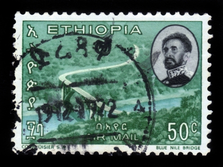ETHIOPIA - CIRCA 1965  A stamp printed in Ethiopia shows  portrait of emperor Haile Selassie and  bridge over blue nile river , circa 1965の写真素材