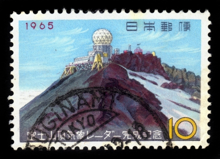 JAPAN - CIRCA 1965  A stamp printed in Japan shows Mount Fuji weather station, circa 1965の写真素材