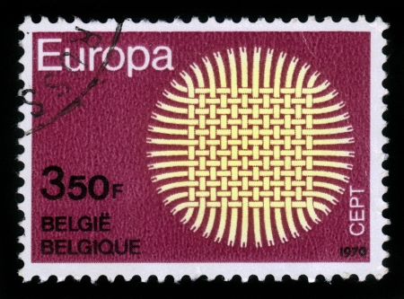 Belgium - CIRCA 1970  A stamp printed in Belgium shows weave in the form of the sun and the word CEPT  European Conference of Postal and Telecommunications , circa 1970のeditorial素材