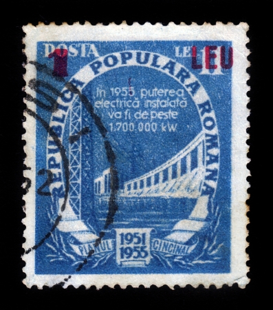 ROMANIA - CIRCA 1955: A stamp printed in Romania shows a hydro power plant, circa 1955のeditorial素材