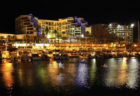 Eilat, Israel - April 12  night view on  marina and moored yachts and boats and modern hotels in popular resort  - Eilat of Israel on April 12, 2013 Eilat, Israelのeditorial素材