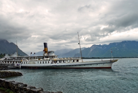 old retro steamer, floating with the tourists on Lake Geneva, Switzerlandのeditorial素材