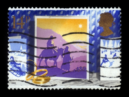 GREAT BRITAIN  - CIRCA 1988  A stamp printed in GREAT BRITAIN  shows image of the journey to Bethlehem, christmas card, circa 1988のeditorial素材
