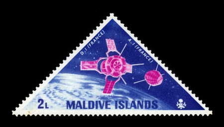 MALDIVES - CIRCA 1968  A stamp printed in Maldives Islands shows a satellites, space, circa 1968のeditorial素材