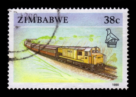 ZIMBABWE - CIRCA 1990  A stamp printed in Zimbabwe shows image of a passenger train, circa 1990のeditorial素材