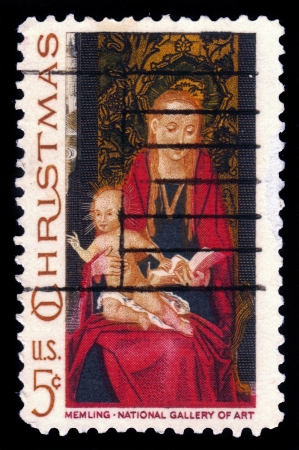 UNITED STATES - CIRCA 1966  A stamp printed in United States of America shows Madonna and Child based on a painting by the Flemish artist Hans Memling, circa 1966のeditorial素材