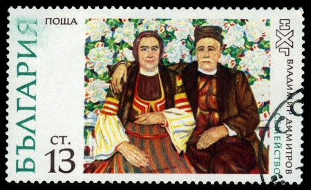 BULGARIA - CIRCA 1982  a stamp from Bulgaria shows a painting   family   by bulgarian artist Vladimir Dimitrov, who was known as the  Master , circa 1982のeditorial素材