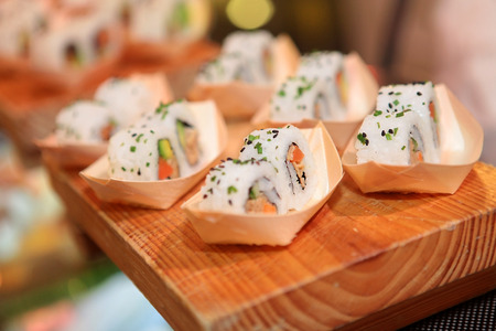 delicious seafood, sushi roll closeup on wooden boardの写真素材