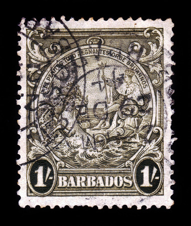 BARBADOS - CIRCA 1938  A stamp printed in Barbados shows badge of the colony, portrait of George VI, King of England, riding on a chariot across the sea, circa 1938のeditorial素材