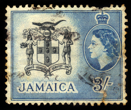 JAMAICA - CIRCA 1956  A stamp printed in Jamaica shows coat of arms of Jamaica, circa 1956のeditorial素材