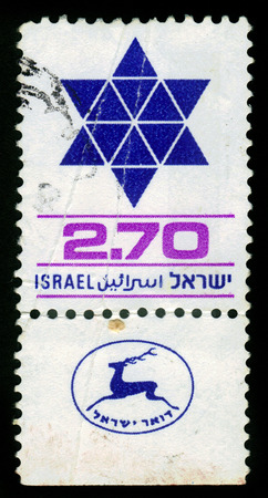 ISRAEL - CIRCA 1979  A stamp printed in the Israel shows six-pointed star, David Shield, circa 1979のeditorial素材