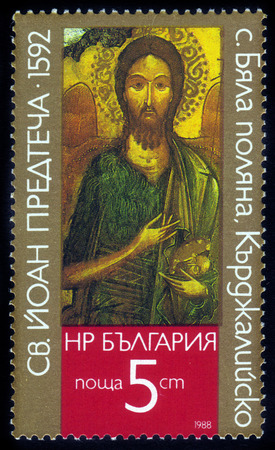 BULGARIA - CIRCA 1988  A stamp printed in Bulgaria shows a icon of John the Baptist from the Kardzhali region of Bulgaria, circa 1988 の写真素材