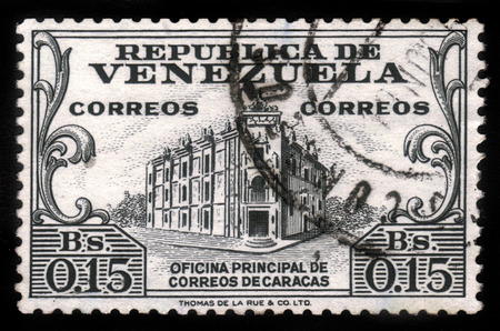 VENEZUELA - CIRCA 1958: a stamp printed in the Venezuela shows General Post Office, Caracas, grey, series, circa 1958のeditorial素材
