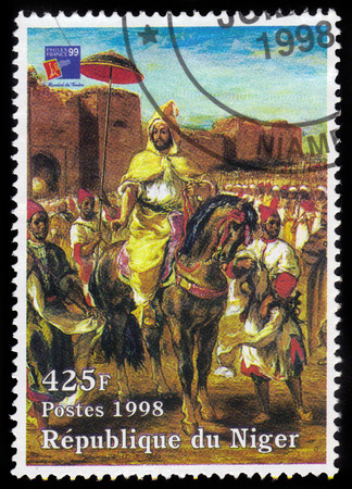 REPUBLIC NIGER - CIRCA 1998: A stamp printed in Niger shows painting by Eugene Delacroix, Muley Abd el Rahman, series, circa 1998のeditorial素材