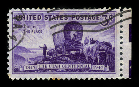 United States - CIRCA 1947: A stamp printed in United States shows the first settlers in Utah, commemorating the Centennial of Utah, circa 1947の写真素材