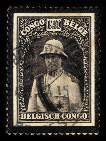 BELGIAN CONGO - CIRCA 1934: A stamp printed in Belgian Congo shows portrait of King Albert I in military costume, mourning stamp, circa 1934のeditorial素材