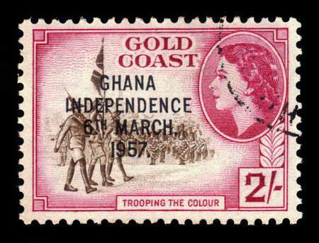 GHANA - CIRCA 1957: A stamp printed in Ghana shows standard bearers and queen Elizabeth II, stamp of Gold Coast overprinted in black, Ghana Independence, circa 1957のeditorial素材