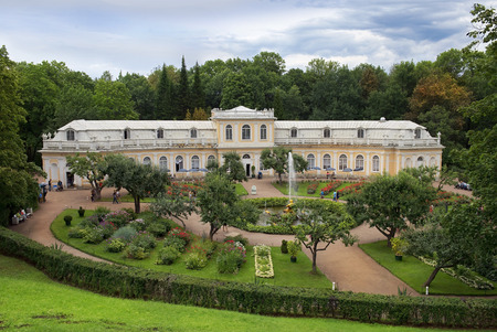 ST. PETERSBURG, RUSSIA - August 14: Grand Orangery and Triton Fountain, Lower Gardens (Park) in Peterhof, Saint Petersburg, Russia on August 14, 2014のeditorial素材
