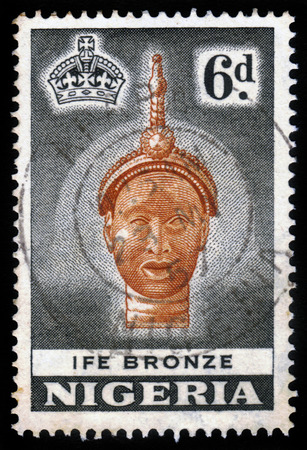 Nigeria - CIRCA 1953: a stamp printed in Nigeria shows the Bronze Head from Ife, circa 1953のeditorial素材