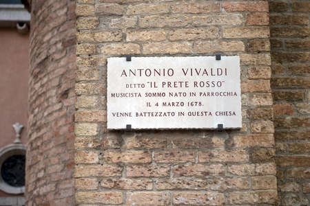 memorial plaque on the wall of the church where he was baptized great Italian musician Antonio Vivaldi, Venice, Italyのeditorial素材
