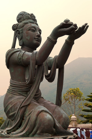 six bronze statues known as \\\\\\\"The Offering of the Six Devas\\\\\\\", symbolise charity, morality, patience, zeal, meditation, and wisdom, all of which are necessary to enter into nirvana, Po Lin Monastery, Lantau Island, Hong Kongのeditorial素材