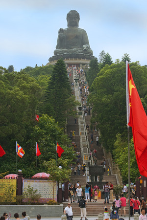 HONG KONG - September 25: tourists on the stairs leading to the statue of Big Buddha, Po Lin buddhist monastery, Lantau Island on September 25, 2013 in Hong Kong, Chinaのeditorial素材