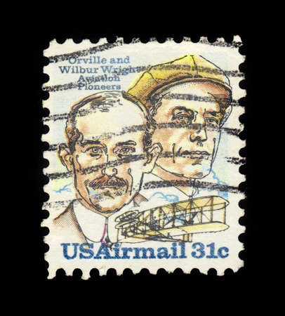 USA - CIRCA 1978: a commemorative stamp printed in the USA shows image of the brothers Orville and Wilbur Wright, american aviation pioneers, honoring the 75th anniversary of first powered flight, circa 1978のeditorial素材