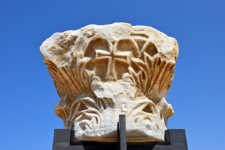 remains of ancient corinthian columns on a background of the blue sky, Caesarea Maritima national park, Israelのeditorial素材