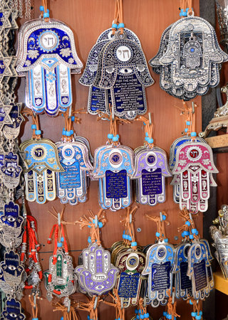 hamsa - traditional palm-shaped amulet popular the Middle East and North Africa, used as a sign of...