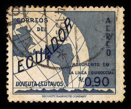 Ecuador - CIRCA 1953: A stamp printed in Ecuador shows globe with equator, Ecuador, inscription monument on the line equator, circa 1953;のeditorial素材