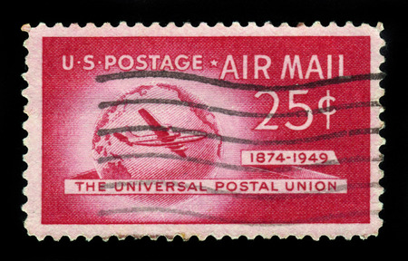 USA - CIRCA 1949: A stamp printed in USA shows Boeing Stratocruiser and Globe, Universal Postal Union Issue, circa 1949のeditorial素材
