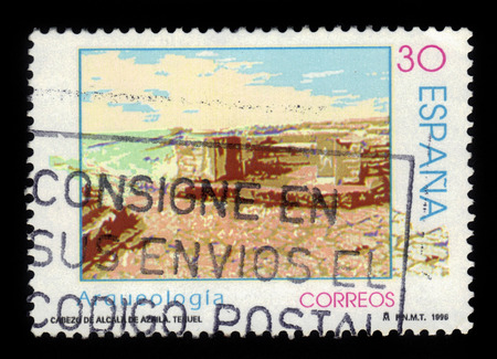 SPAIN, CIRCA 1996: stamp printed in Spain , shows archaeological excavations in Cabezo de Alcala de Azaila, Teruel, circa 1996のeditorial素材