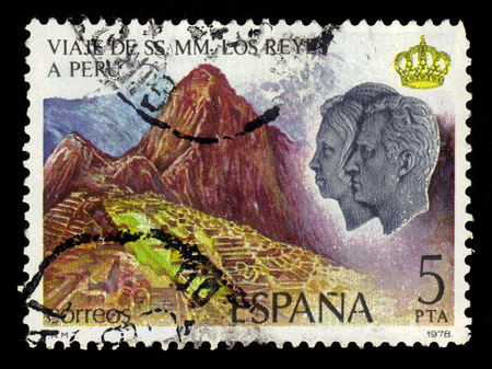 SPAIN, CIRCA 1978: stamp printed in Spain , shows Machu Picchu,  portraits of King Juan Carlos and Queen Sofia, Royal Visit to Peru, circa 1978のeditorial素材