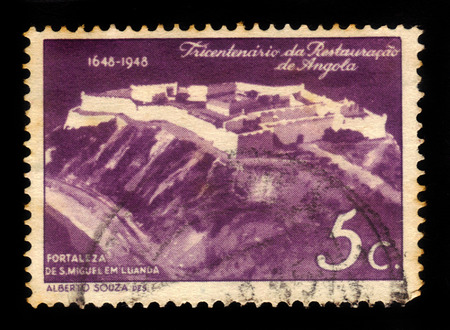 Angola - circa 1948: A stamp printed in Angola shows Saint Michael Fortress, portuguese fortress built in Luanda, 300th anniv. of the restoration of Angola to Portugal, circa 1948のeditorial素材