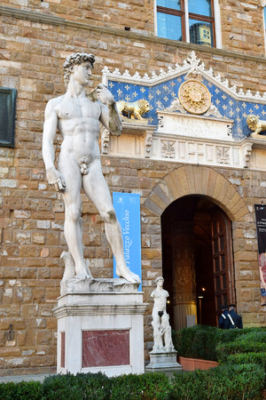 FLORENCE, ITALY - February 18, 2017: copy of the statue David by Michelangelo in front of the entrance of the Palazzo Vecchio, Piazza della Signoria in Florence, Italyのeditorial素材