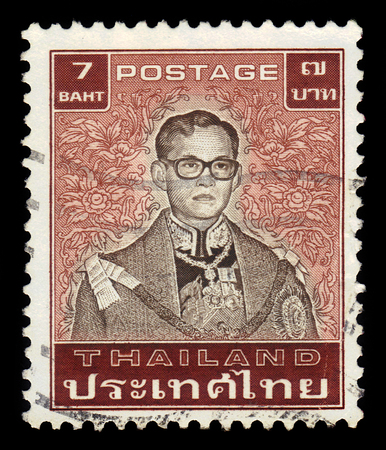 Thailand - CIRCA 1983: A stamp printed in Thailand shows King Bhumibol Adulyadej, King of Thailand ( King Rama IX ), circa 1983のeditorial素材