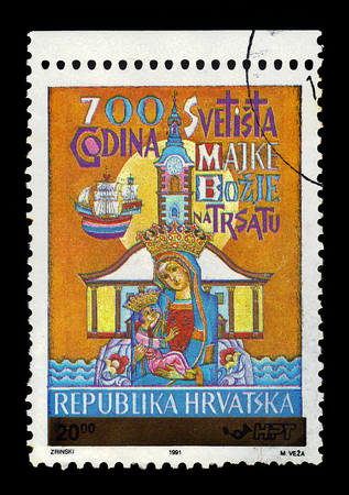 Croatia - CIRCA 1991: A stamp printed in Croatia shows Madonna and Child, the 700 Years of Sanctuary of Holy Mother of Trsat, circa 1991のeditorial素材